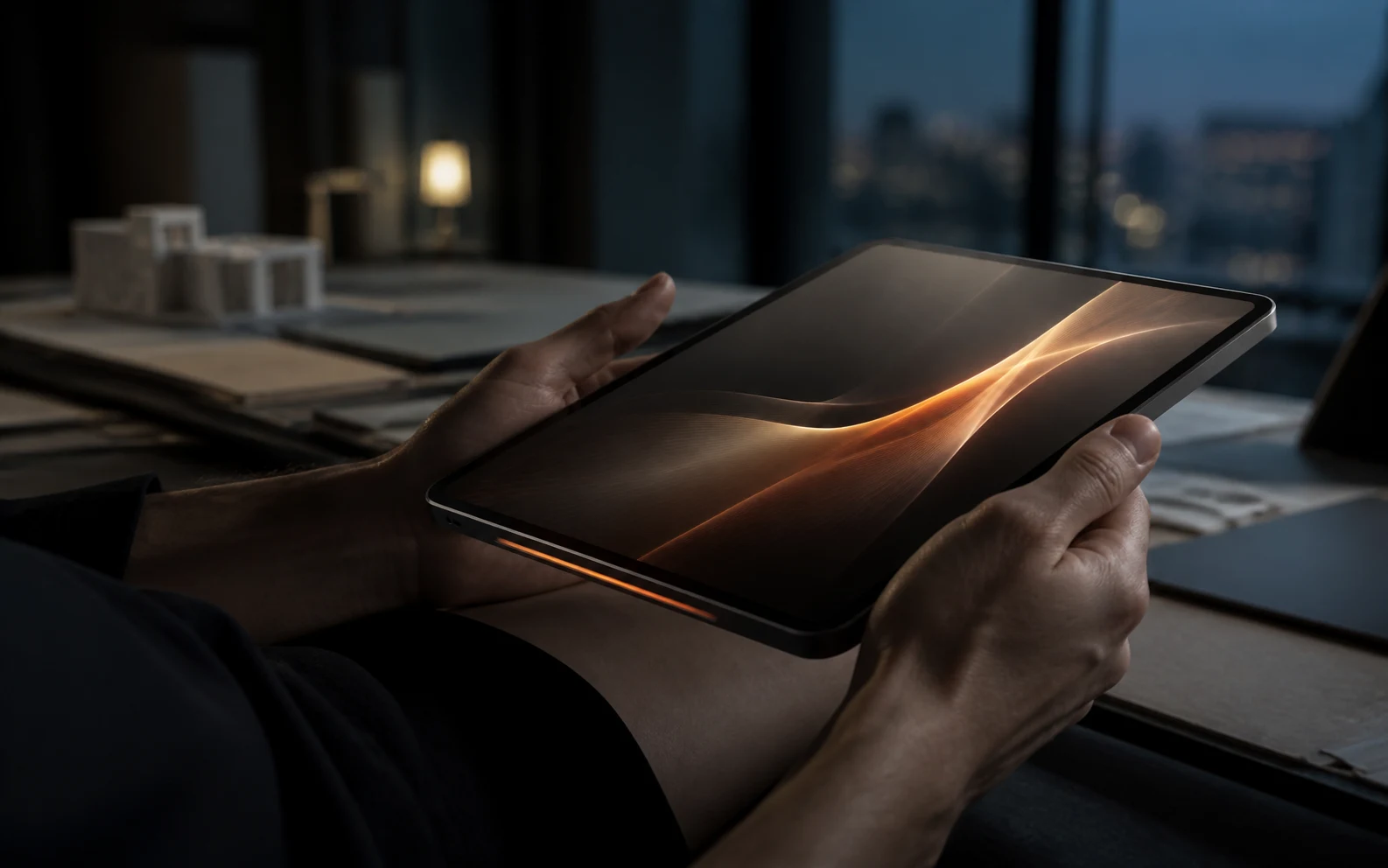 Industrial-design rendering of the proposed Fable Studio slate held in both hands